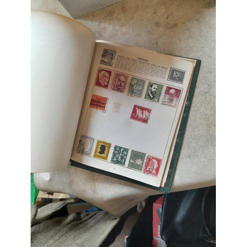 166 - Approx 10 kg of stamps and postcards : loose on paper, in albums, stock books, on pages GB World and... 