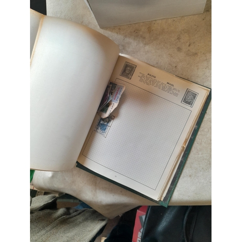 166 - Approx 10 kg of stamps and postcards : loose on paper, in albums, stock books, on pages GB World and... 