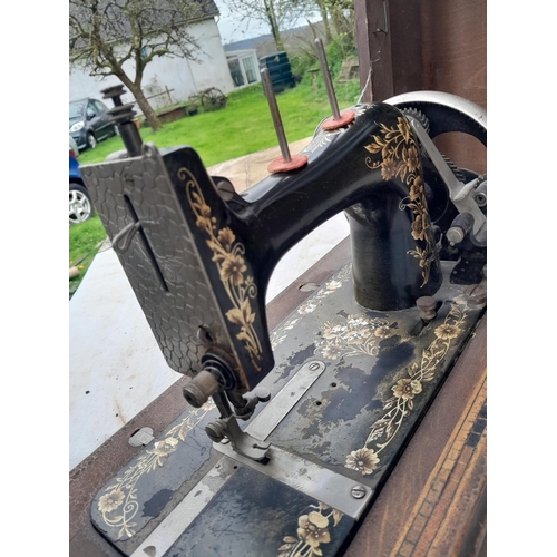 170 - Early 20th century hand crank sewing machine in wooden box