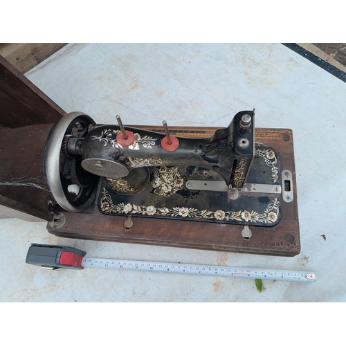 170 - Early 20th century hand crank sewing machine in wooden box