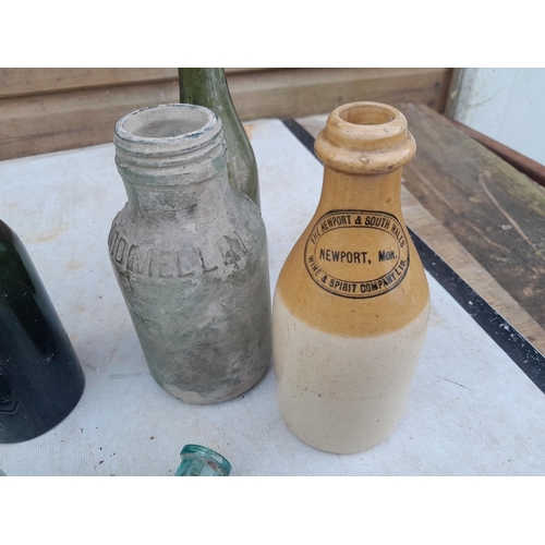 171 - Tip dug advertising and non advertising glass and stoneware bottles : Newport Wine Company, Rogers, ... 