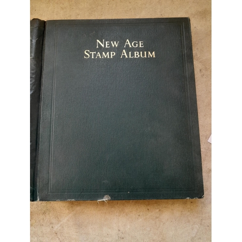 249 - Stamps in a sparsely filled New Age Stamp Album : in average condition, GB £1 Silver Wedding (sadly ... 