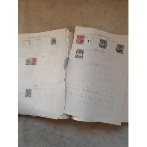 250 - A sparsely filled Ideal Commonwealth Album. an interesting album with earlier stamps sadly let down ... 