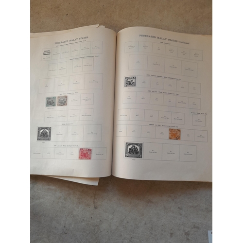 250 - A sparsely filled Ideal Commonwealth Album. an interesting album with earlier stamps sadly let down ... 