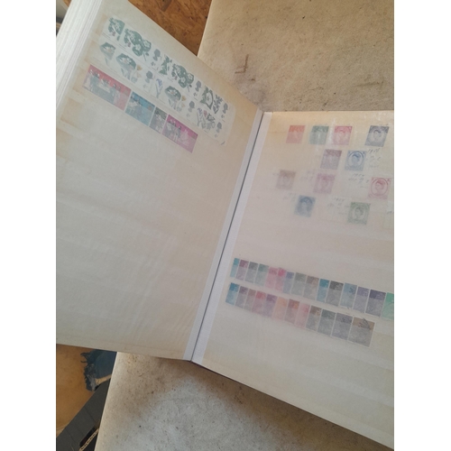 252 - Stamps : QEII in a stock book with duplication