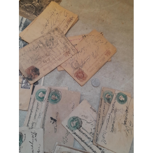 256 - Stamps on paper, postcards, India related and postal history