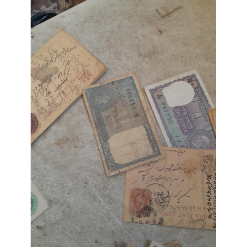 256 - Stamps on paper, postcards, India related and postal history