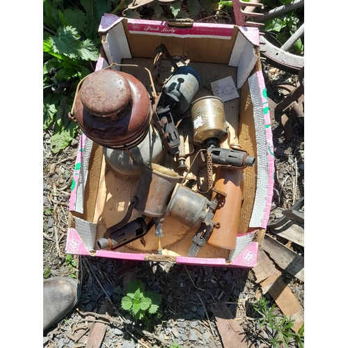 276 - Box of blow torches and Tilley style lamp