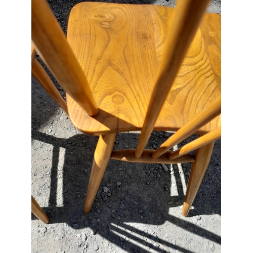 282 - Pair of vintage Ercol stick back chairs circa 1960