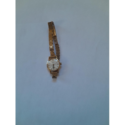 288 - 9 ct gold case and strap with inscription on reverse clearly marked on strap by Zenith with a box gr... 