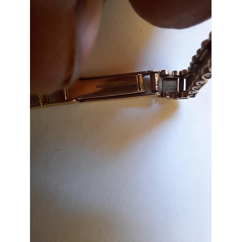 288 - 9 ct gold case and strap with inscription on reverse clearly marked on strap by Zenith with a box gr... 