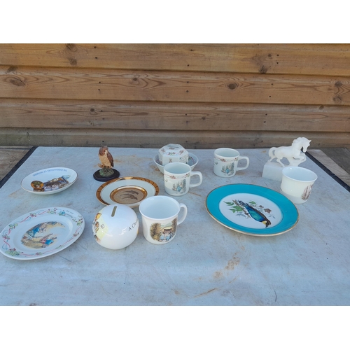 295 - Box of decorative china : Doulton, Wedgwood Beatrix Potter related ceramics, small ornaments