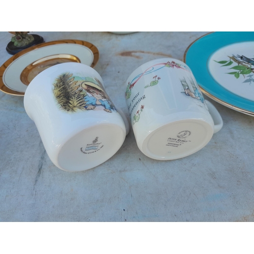 295 - Box of decorative china : Doulton, Wedgwood Beatrix Potter related ceramics, small ornaments