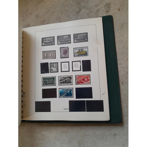 183 - Stamps of Switzerland  in a Linder album remaindered but some better stamps still present