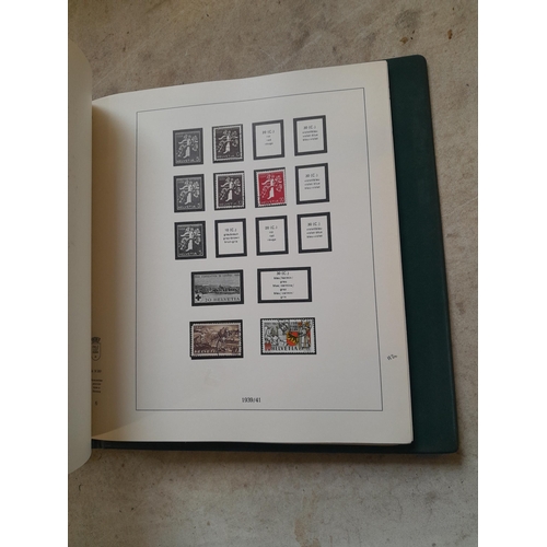 183 - Stamps of Switzerland  in a Linder album remaindered but some better stamps still present