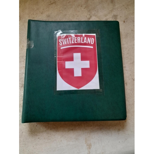 183 - Stamps of Switzerland  in a Linder album remaindered but some better stamps still present