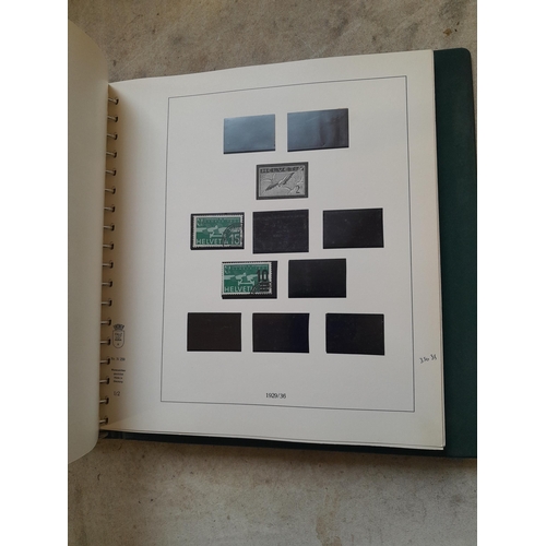 183 - Stamps of Switzerland  in a Linder album remaindered but some better stamps still present