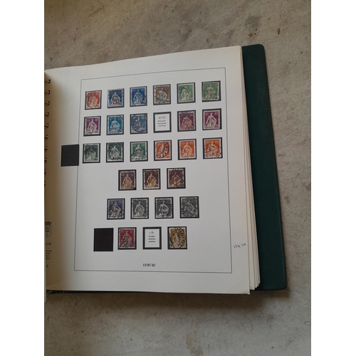 183 - Stamps of Switzerland  in a Linder album remaindered but some better stamps still present