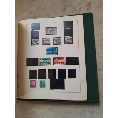 183 - Stamps of Switzerland  in a Linder album remaindered but some better stamps still present