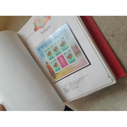 212 - Stamps : 2 volume partially filled Royal Wedding 1981 collection, approx 500 pages on SG printed pag... 
