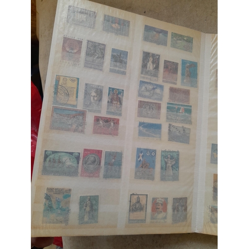 216 - Stamps: World Collection a varied array of Commonwealth and world stamps 32 well filled pages in a L... 