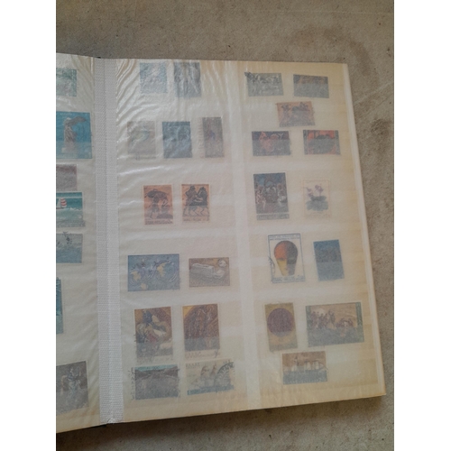 216 - Stamps: World Collection a varied array of Commonwealth and world stamps 32 well filled pages in a L... 