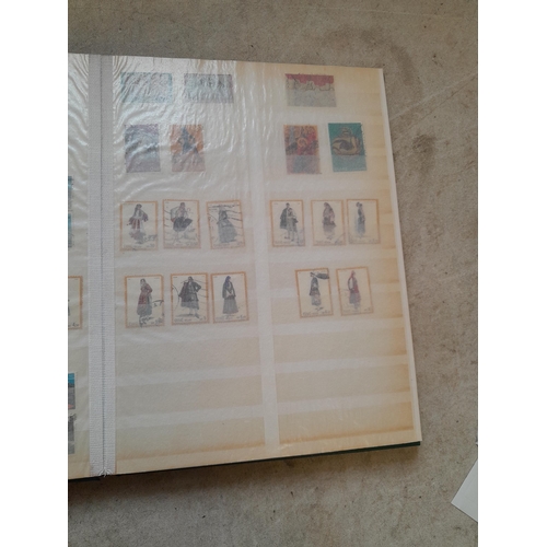 216 - Stamps: World Collection a varied array of Commonwealth and world stamps 32 well filled pages in a L... 