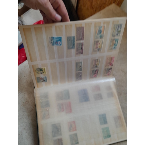 216 - Stamps: World Collection a varied array of Commonwealth and world stamps 32 well filled pages in a L... 