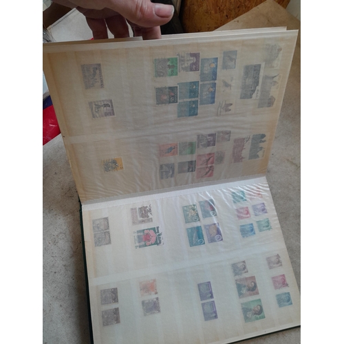 216 - Stamps: World Collection a varied array of Commonwealth and world stamps 32 well filled pages in a L... 