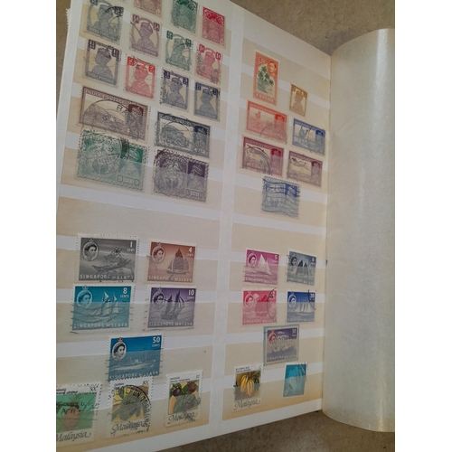 216 - Stamps: World Collection a varied array of Commonwealth and world stamps 32 well filled pages in a L... 