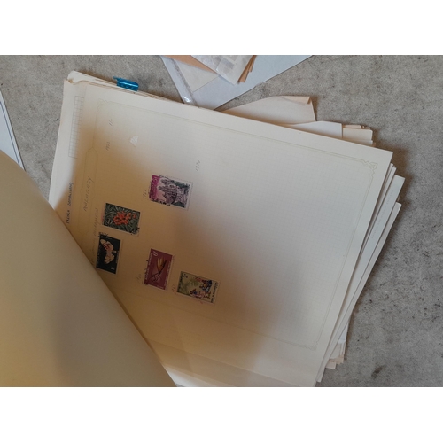 217 - A4 envelope of  stamps of French Colonies, unused and used some loose and some on pages, only a samp... 