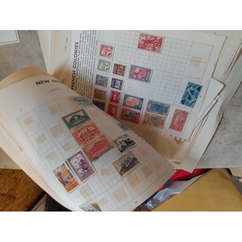 217 - A4 envelope of  stamps of French Colonies, unused and used some loose and some on pages, only a samp... 