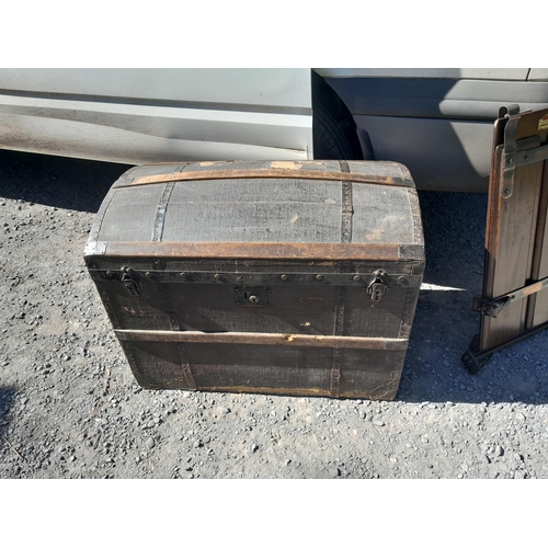 239 - Dome top steamer trunk and trouser press