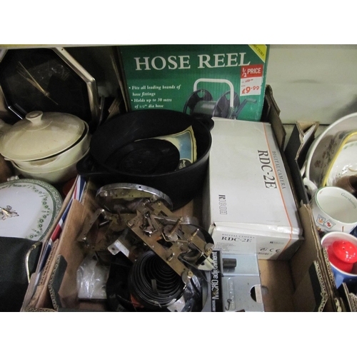 43 - Box to Include Hose Reel, Cast Cooking Pot & Clock Workings.