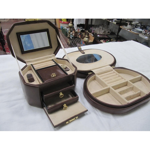 182 - Two Leather Travel Jewellery Cases.