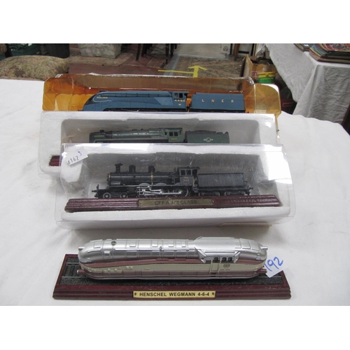 192 - Four Model Trains on Plinths - 