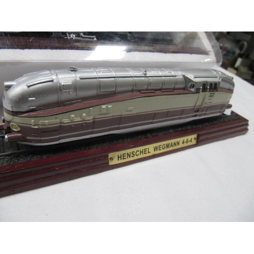 192 - Four Model Trains on Plinths - 