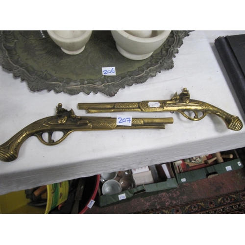 207 - Pair of Brass Gun Wall Plaques.