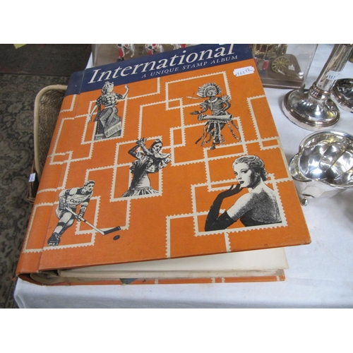 212 - International Unique Stamp Album & Contents.