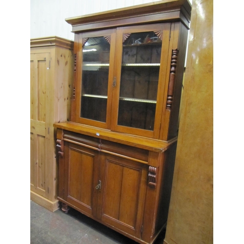 702 - Glazed Top Bureau Bookcase over Double Cupboard and 2 Secret Drawers.