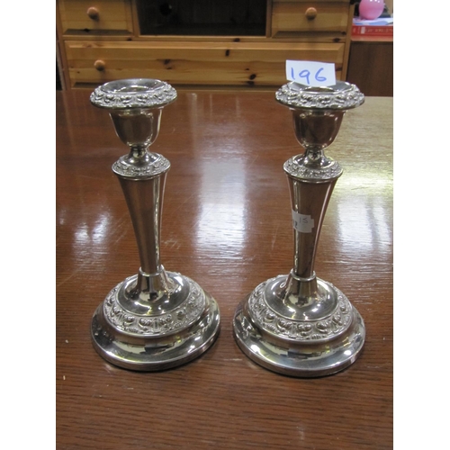 196 - Pair of Plated Candlesticks.