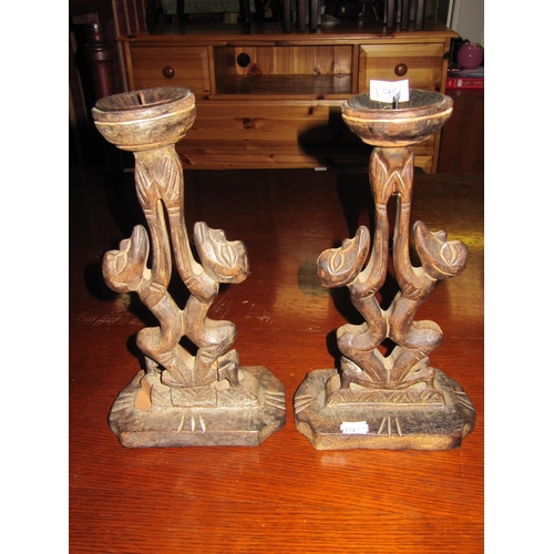 199 - Pair of Wooden Carved Candle Holder Figures - One at fault chip to base.