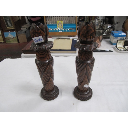 204 - Pair of Carved Oak Candlesticks.