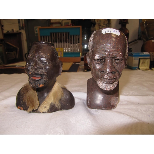 205a - Two African Head Figures.