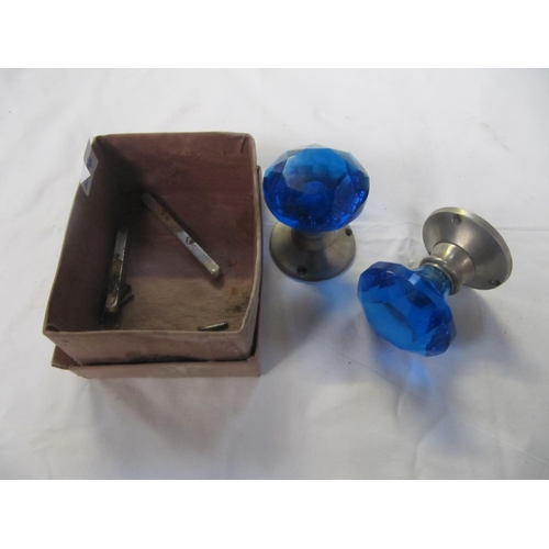 244 - Boxed Pair of Facetted Glass Turquoise Door Knobs.