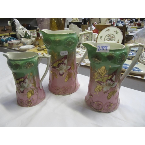 289 - Set of Three Pink, Green & Gilt Floral Dresser Jugs.