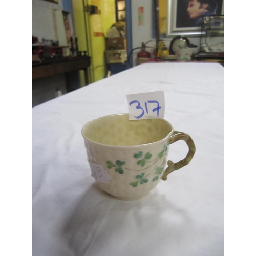 317 - Early Belleek Black Mark Shamrock Coffee Cup.