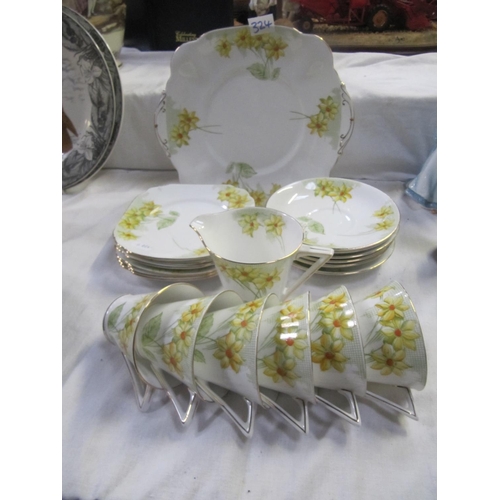 324 - 20 Piece Yellow Flower Tea Set.