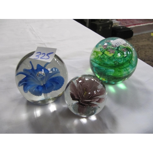 325 - Three Glass Floral Paperweights.