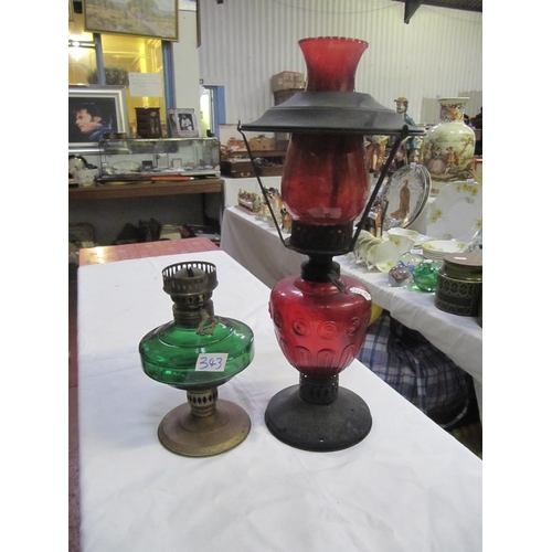 343 - Two Single Burner Oil Lamps - One Green Glass, One Red Glass.